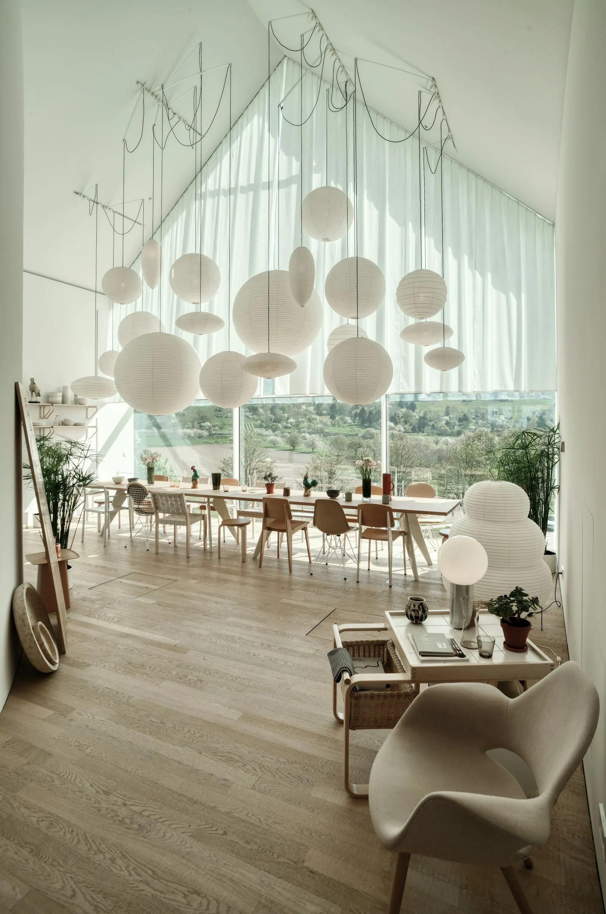 Lounge with soft furniture beside a large window